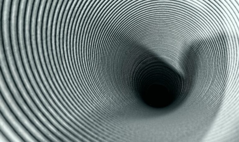 Black and white tunnel representing workplace stress and pressure, symbolising feeling trapped or overwhelmed.